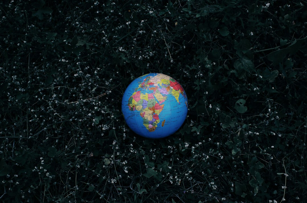 Glowing digital network connections over the globe
